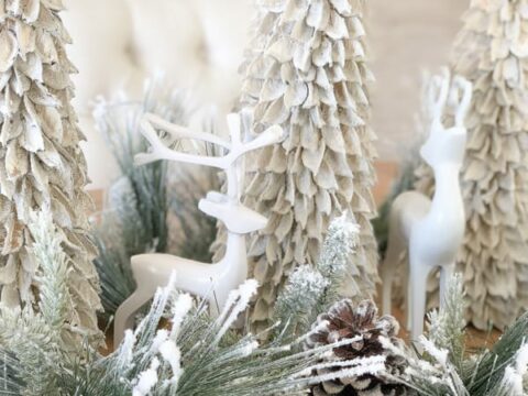 Rustic Tabletop Trees with Frosted Greens and Reindeer create a beautiful, rustic look