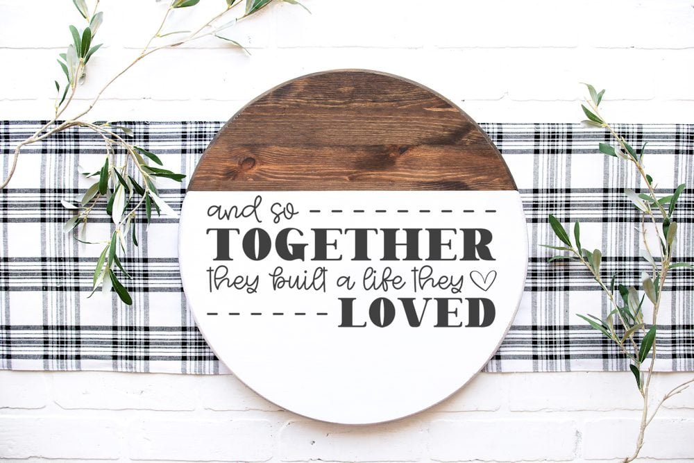 Wood round stained and painted with family quote
