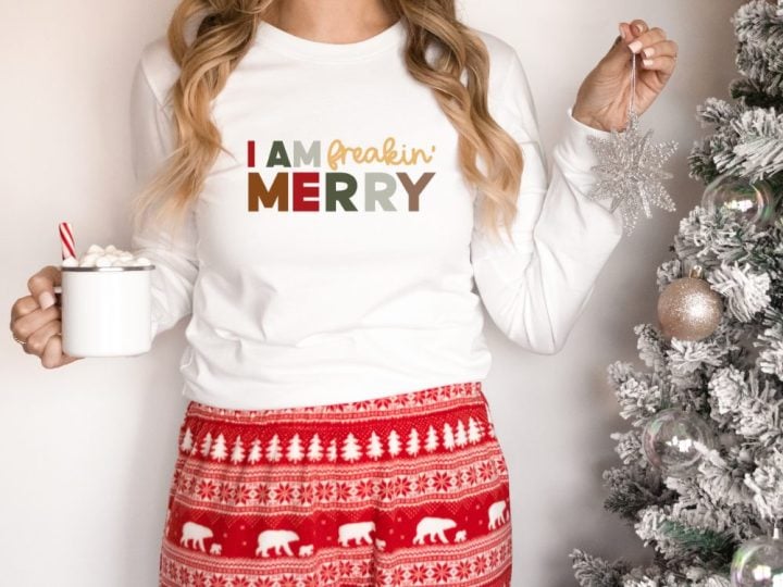 White shirt with "I am Freakin Merry" saying