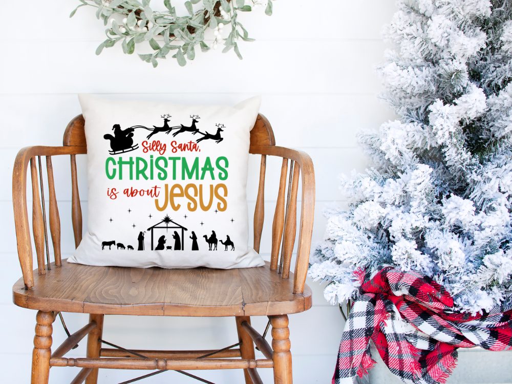 Christmas pillow with santa and Jesus quote