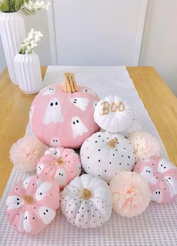Pastel pink and white painted pumkins